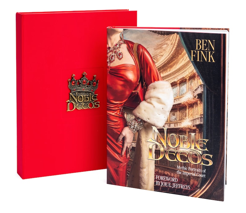 May include: A red hardcover book titled "Noble Decos: Mythic Portraits of the Imperial Court" by Ben Fink with a foreword by Joe E. Jeffreys. The book cover features a woman in a red dress and a white fur stole. The book is in a red slipcase with a gold crown and the words "Noble Decos" on the front.