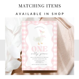 May include: A pink and white gingham patterned invitation card featuring a cartoon goose wearing a party hat. The text "ONE silly goose" is displayed. The card includes event details and the text "MATCHING ITEMS AVAILABLE IN SHOP".