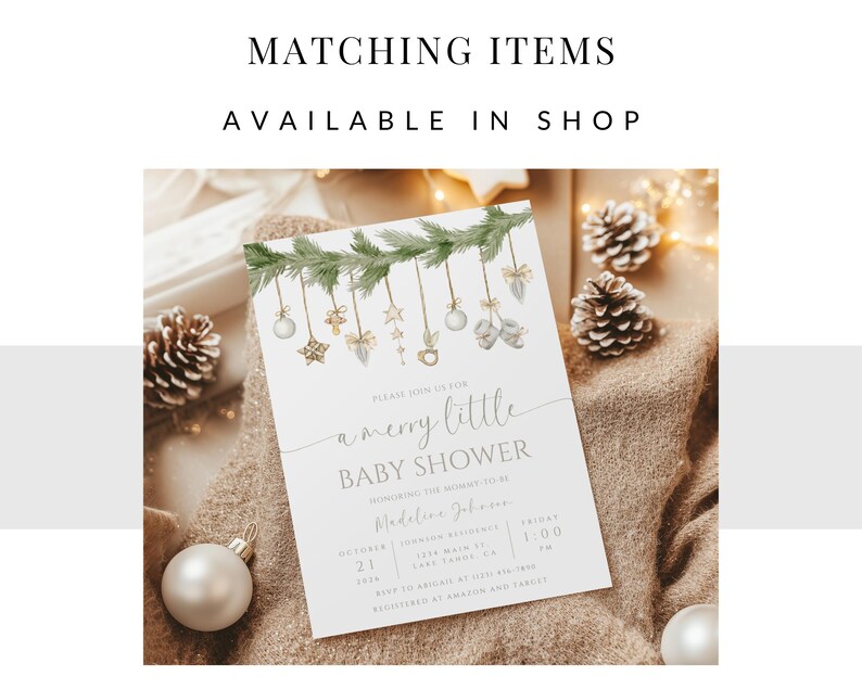 May include: A white baby shower invitation with a green garland of pine branches and ornaments. The text reads "Please join us for a merry little baby shower honouring the mommy to be Madeline Johnson.  October 21, 1:00 PM.  RSVP to [email protected] Registered at Amazon and Target."