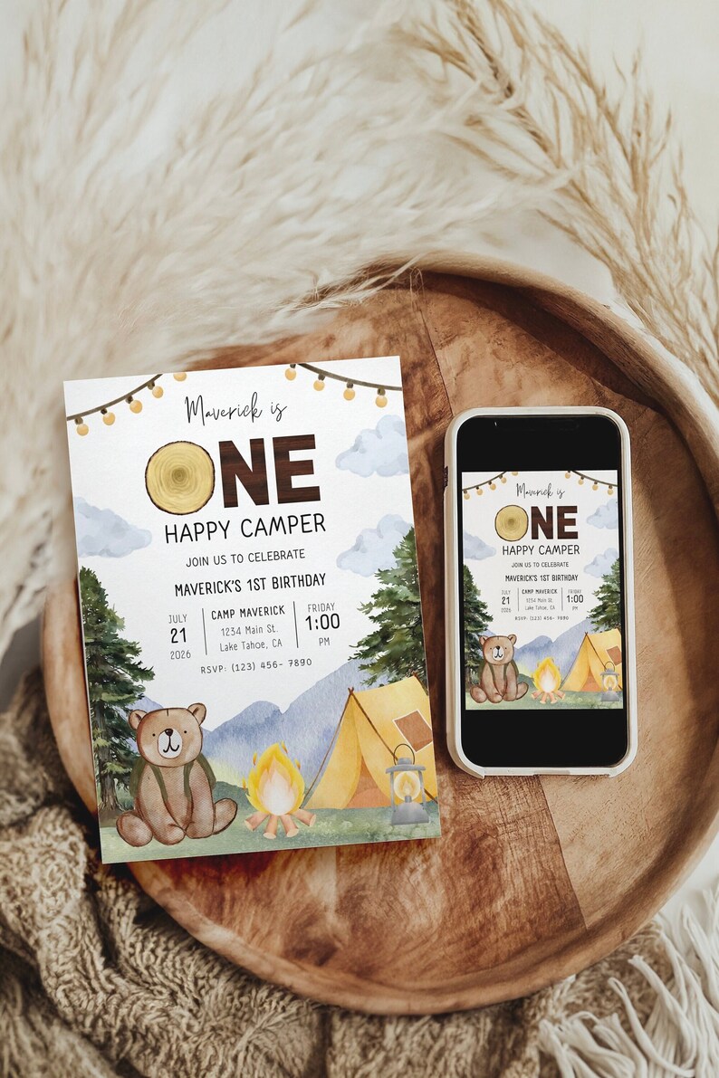 One Happy Camper Invitation shows printed and mobile invite. Includes bear, forest trees, mountains, tent, and lantern.