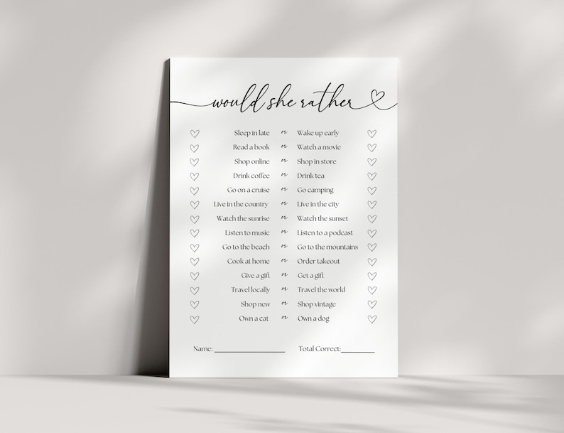 May include: A printable "Would She Rather" game with a black and white design. The game features a list of 16 questions with two choices each. The questions are about lifestyle preferences, such as whether someone would rather sleep in late or wake up early, read a book or watch a movie, drink coffee or drink tea, and so on.