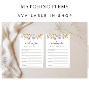 May include: Two printable baby shower cards with a floral design. The cards have the text "Wishes for Baby Brighton" and a list of wishes for the baby.
