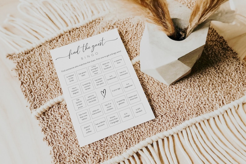 Find the Guest Bingo with instructions, "find someone who matches the clues. First one to get a bingo wins" Minimalist design.