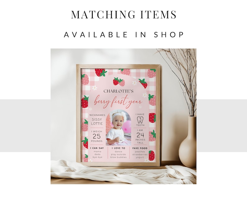 May include: A pink and white printable first birthday sign with a strawberry theme. The sign features a photo of a baby girl, along with details about her first year, including her nicknames, weight, height, and favorite foods. The text on the sign reads "Charlotte's Berry First Year".