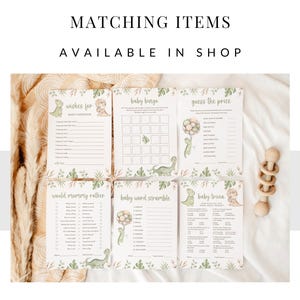 Op de afbeelding: Zes witte papieren spelkaarten voor een babyshower met groene dinosaurusillustraties en botanische accenten. De kaarten bevatten titels zoals Wishes for Baby, Baby Bingo, Guess the Price, Would Mommy Rather, Baby Word Scramble en Baby Trivia.