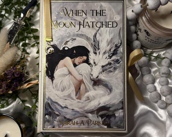 When the Moon Hatched by Sarah A Parker rebind with art by Caroline Wendelin