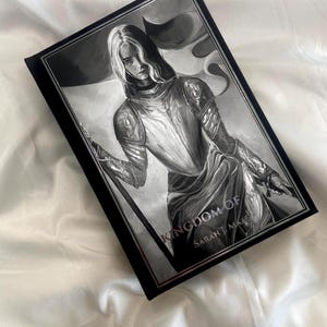 Kingdom of Ash by Sarah J Maas rebind special edition with Olivia Rose James art