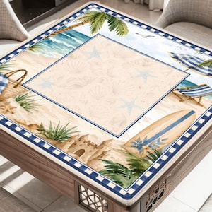 May include: A square wooden table with a beach-themed design. The top features a watercolor illustration of a sandy beach with a surfboard, sandcastle, and seashells. The border is a blue and white pattern.