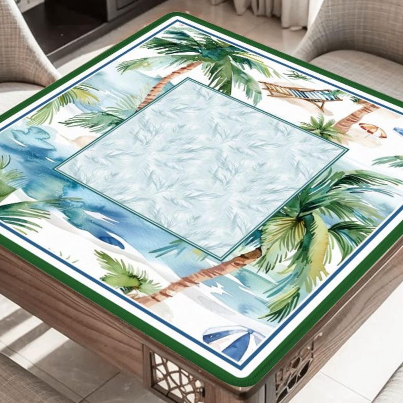 May include: A square table with a tropical beach scene printed on the surface. The design features palm trees, a beach, and ocean waves in shades of green, blue, and brown. The table has a green border and a wooden frame.