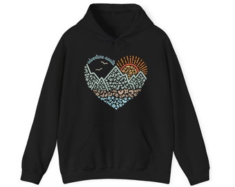 La aventura espera sudadera con capucha unisex Heavy Blend™