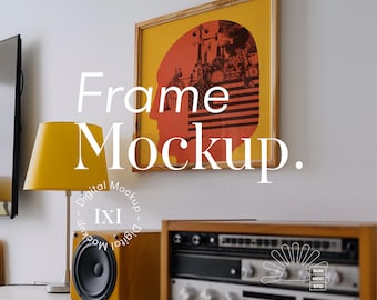 May include: A wooden frame mockup with a yellow background and a colorful abstract image inside. The frame is on a white wall with a yellow lamp and a vintage stereo receiver below it.