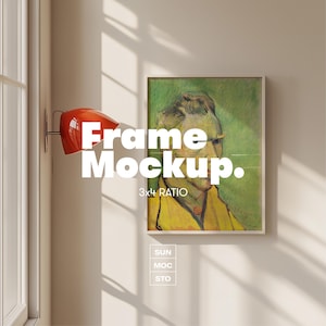 May include: A framed print of a painting featuring a man in a yellow coat against a green background. The frame is white. The words "Frame Mockup" and "3x4 RATIO" are printed on the wall. A red lamp is mounted on the wall.