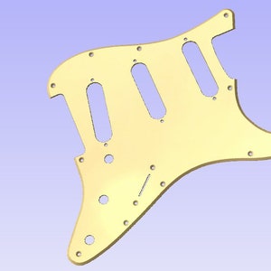 May include: A gold-colored guitar pickguard with three cutouts for pickups and multiple screw holes.
