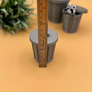 Small trash can storage container.