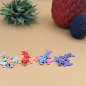 Pastel and rainbow wyvern dragon toys.