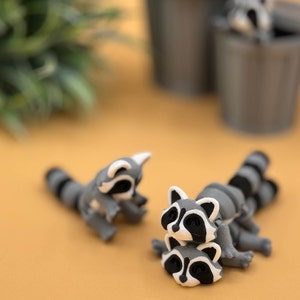 Cute 3D printed raccoon toys are made with high quality PLA.