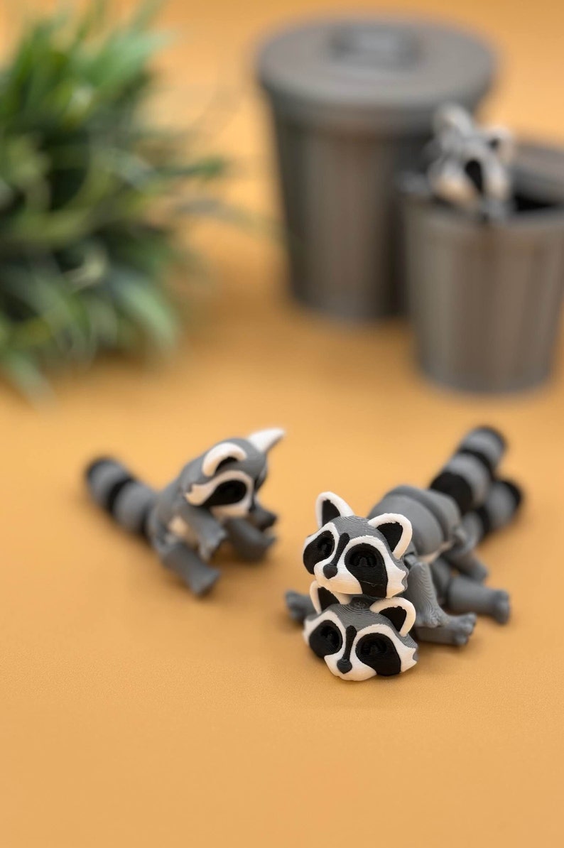 Cute 3D printed raccoon toys are made with high quality PLA.