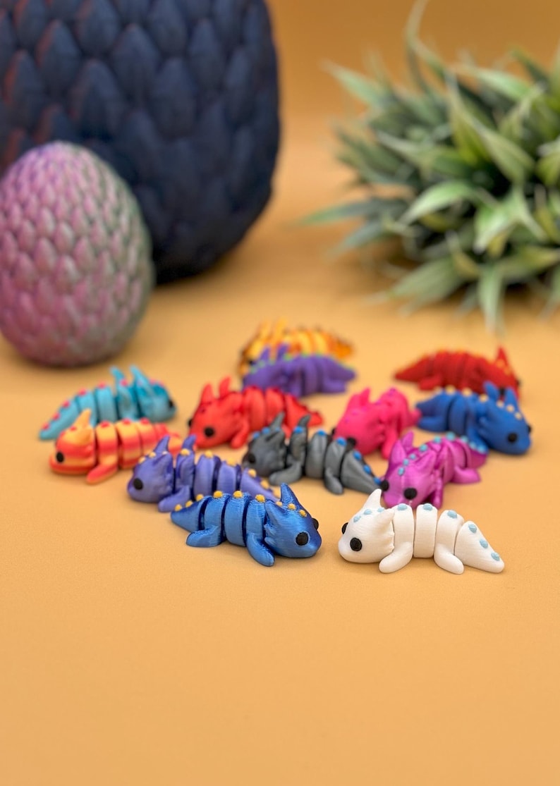 3D printed dragon fidget and sensory toys.