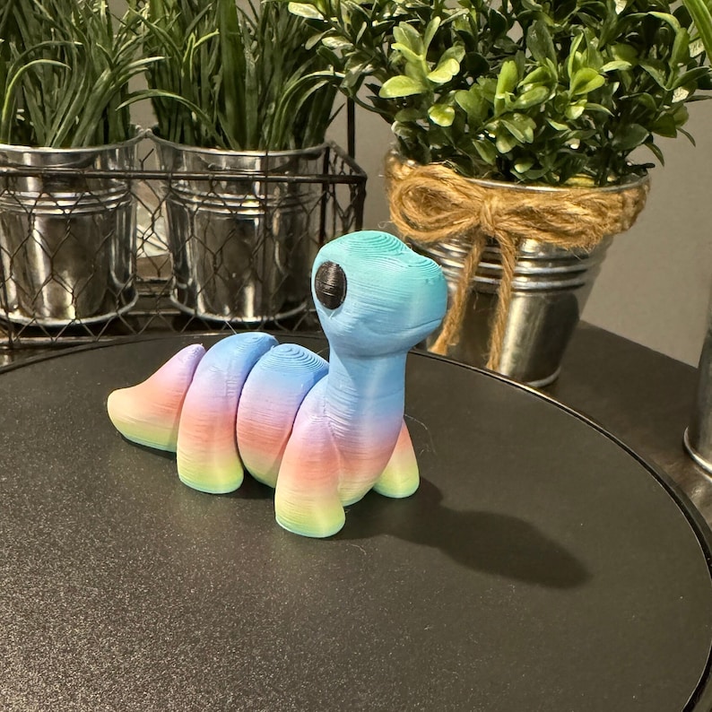 Example of a 3D printed rainbow brachiosaurus.