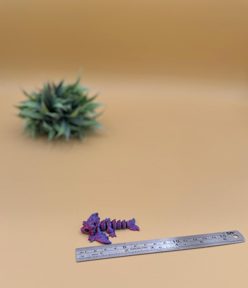 3D printed wyvern dragon toys are about 2.5 inches long.
