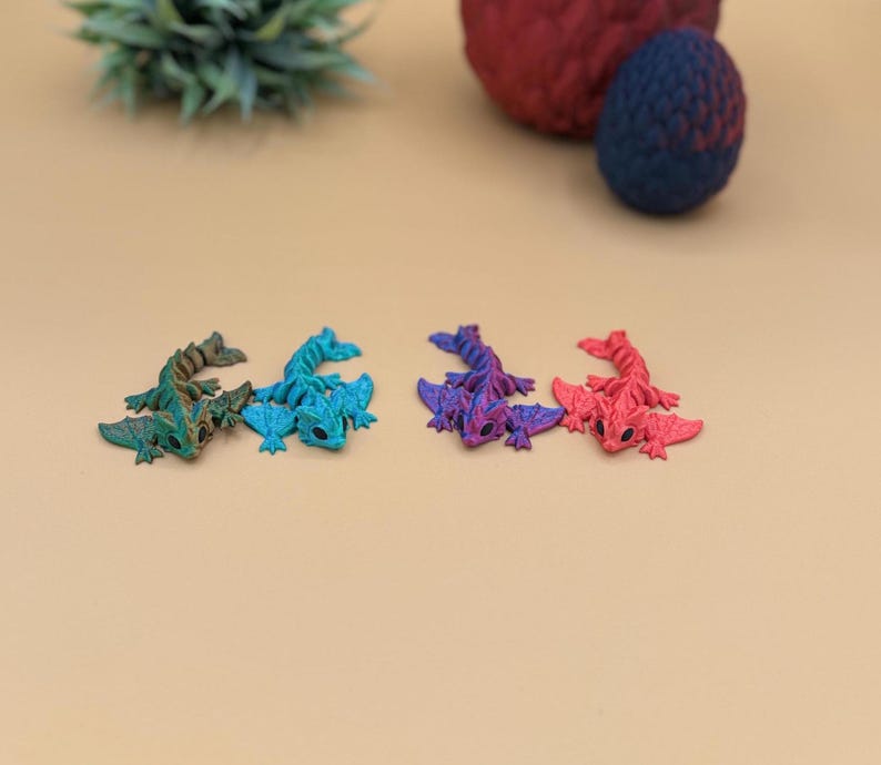 A variety of 3D printed baby wyvern dragons.