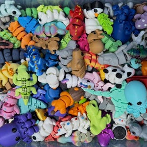 A random assortment of 3D printed mini animal toys.