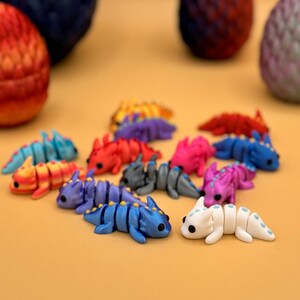 Some 3D printed dragon assorted toys.