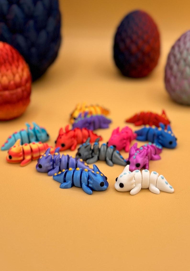 Some 3D printed dragon assorted toys.