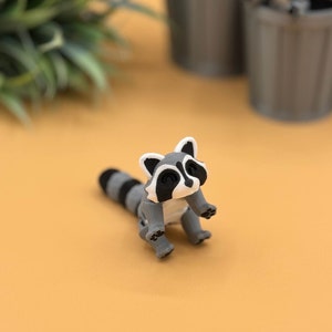 Panda fidget and sensory toys have black paw prints.