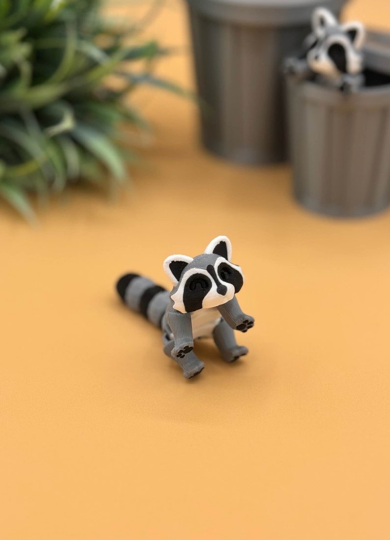 Panda fidget and sensory toys have black paw prints.