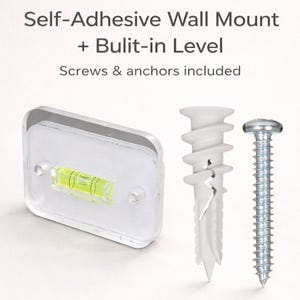 May include: A clear, rectangular self-adhesive wall mount with a built-in level, a white plastic wall anchor, and a silver screw. The text "Self-Adhesive Wall Mount + Built-in Level" is at the top of the image.