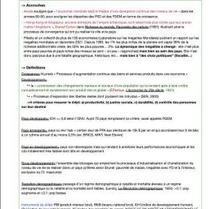 May include: A page of handwritten notes in French about economic development, including definitions of key terms like "development" and "convergence". The notes discuss the importance of economic growth, poverty reduction, and social inclusion.