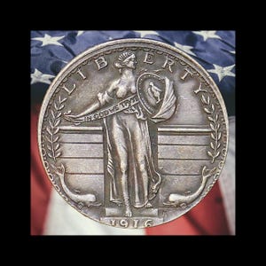 May include: A 1916 Standing Liberty quarter coin featuring a central figure of Liberty holding a shield and a banner inscribed with IN GOD WE TRUST. The coin displays the word LIBERTY at the top, laurel branches on the sides, and two dolphins.