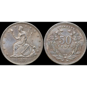 May include: A silver 50-cent coin with the year 1871 on the front and the words "STANDARD 50 CENTS" on the back.