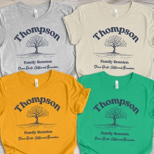 May include: Four short-sleeved t-shirts in grey, cream, yellow, and green. Each shirt displays the name "Thompson" above a tree graphic and the text "Family Reunion" and "Same Roots, Different Branches."