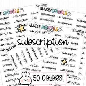 May include: White sticker sheets with the word "subscription" in a handwritten font. The stickers are from WUNDER DOODLE and include a bunny and star graphic. The image also includes a sign that says "50 COLORS!"