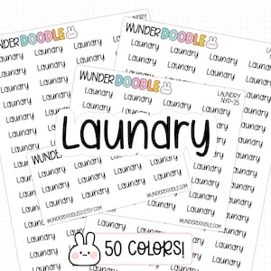 Puede incluir: Hojas de pegatinas blancas con la palabra "Laundry" en varios tamaños y fuentes. Las pegatinas tienen un logotipo colorido "Wunder Doodle" y un gráfico de conejito. También se ve el texto "50 Colors!"