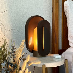 Turned On Mid Century Modern Bedside Lamp with a dimmable light and smart LED APP control.