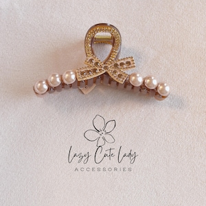 Bow & Pearl Claw Clip – Glamorous Rhinestone Accent Hair Claw