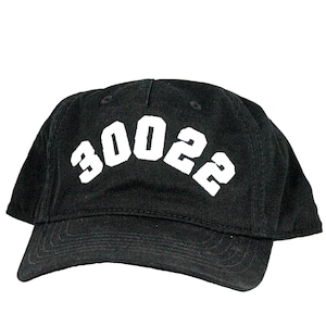 May include: A black baseball cap with a white embroidered number "3022" on the front.