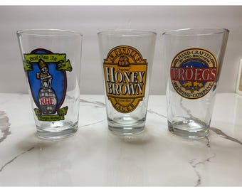 Lot of 3 Beer Pint Glasses Rogue Dead Guy Ale JW Dundee Honey Brown Troegs 16oz