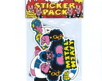 May include: A clear plastic bag containing a sticker pack. The pack features several colourful stickers with cartoon designs, including a gorilla and a figure with blue and yellow hair. The top of the pack reads "STICKER PACK" and "davelikestoarty's".