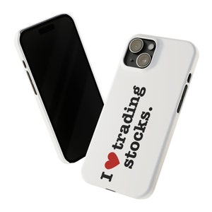 May include: White phone case with a red heart and the text "I love trading stocks."