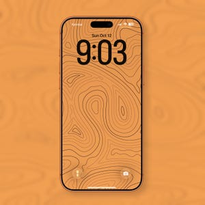 May include: A gold smartphone shows a topographic map lock screen with the time 9:03. The date, Sunday, October 12, is also displayed. The phone is set against a wood-grain background.