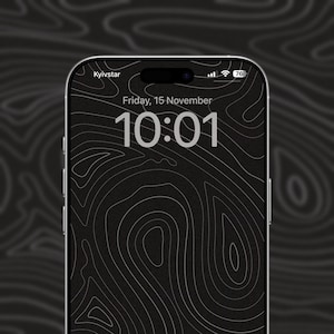 May include: A black and white phone screen with a topographic map design. The time is 10:01 and the date is Friday, 15 November.