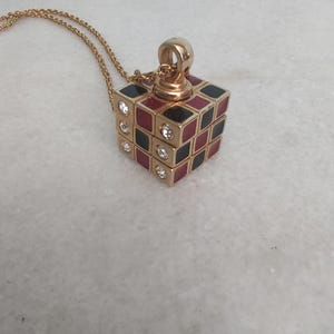 Swarovski Rubik&#39;s Cube Gold Tone Tri Level Spin Cube Pendant Necklace Marked Swan. Pendant Approx 1.25&quot; Tall 0.75&quot; Wide, Chain 32&quot; -EE174A3