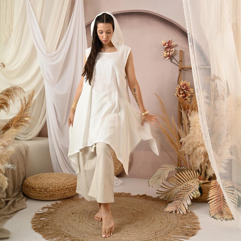 Soft Season Asymmetrical Tulip Hem Knit Top (Off White)