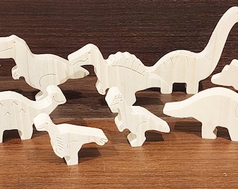 May include: A set of ten wooden dinosaur toys, all painted in a natural wood color. The dinosaurs include a stegosaurus, a triceratops, a brachiosaurus, a tyrannosaurus rex, and several others.