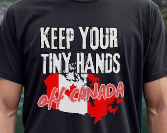 Puede incluir: Camiseta negra con un gráfico blanco que dice "Keep your tiny hands off Canada" con una bandera canadiense roja y blanca en el fondo.