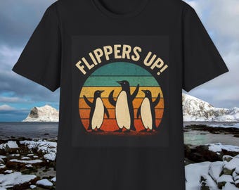 May include: Black t-shirt with a vintage-style graphic of three penguins with the text "Flippers Up!" in white.